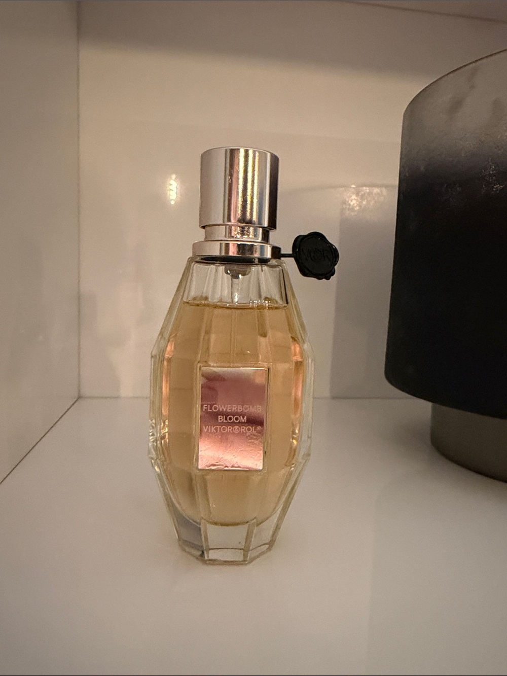 Viktor & Rolf Faceted Glass Perfume Bottle with Pink Tones and Gold Cap